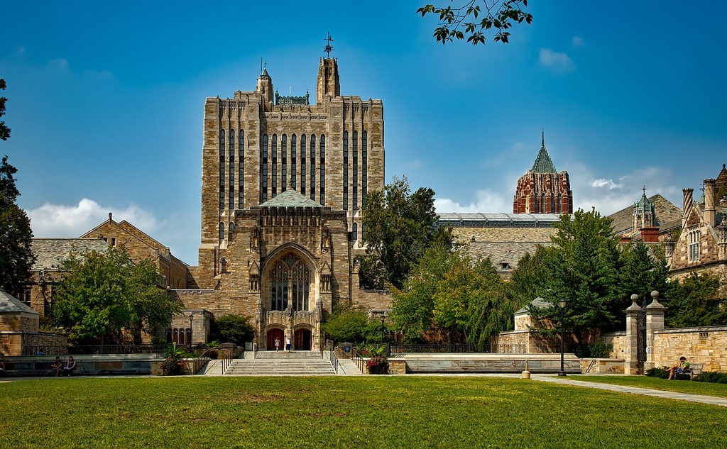 Gothic Yale University campus buildings framed by trees