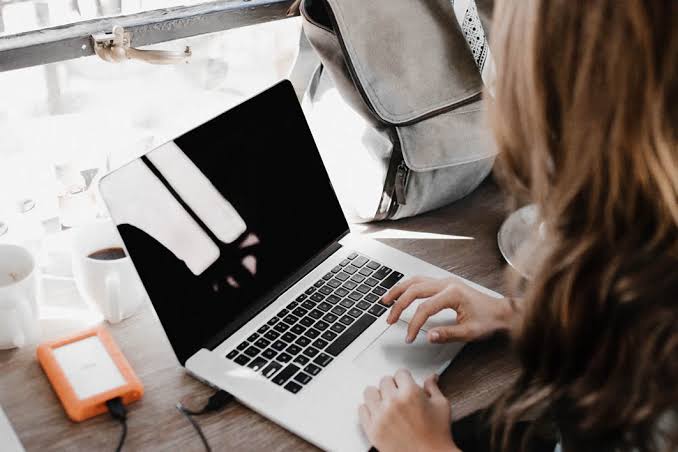 A student joining an online tutoring session on a laptop